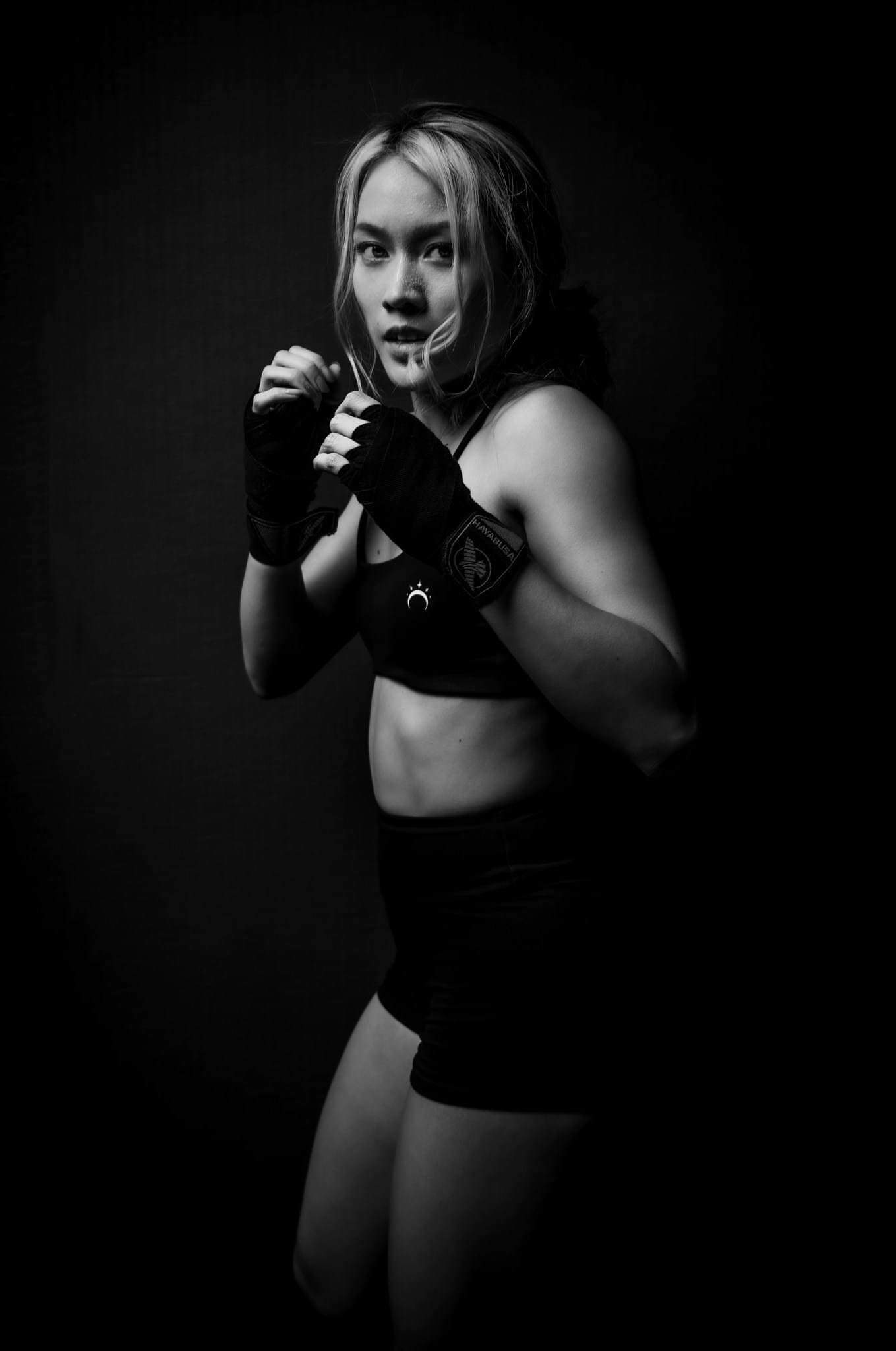 Beginner practicing kickboxing for confidence with proper stance and guard
