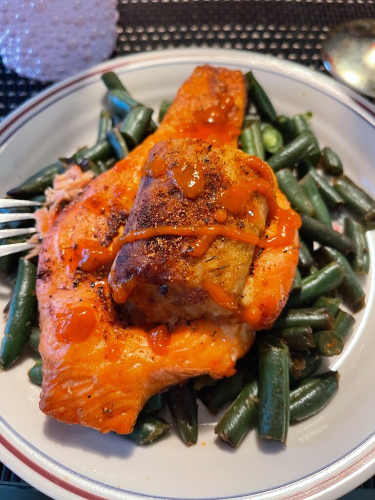 Healthy baked salmon recipe on a plate — How To Live 30