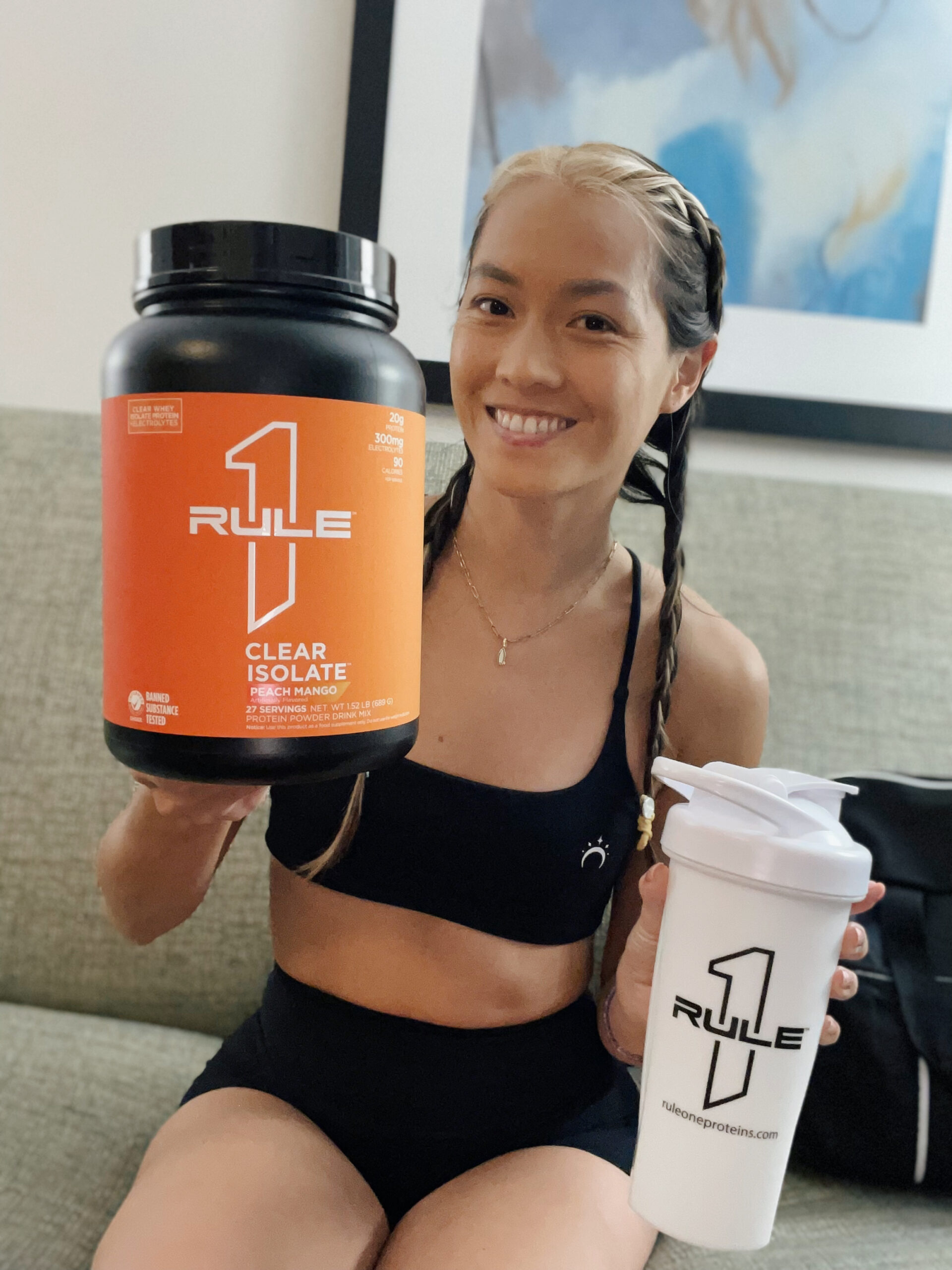 Supplement stack flatlay with shaker bottle and protein powder