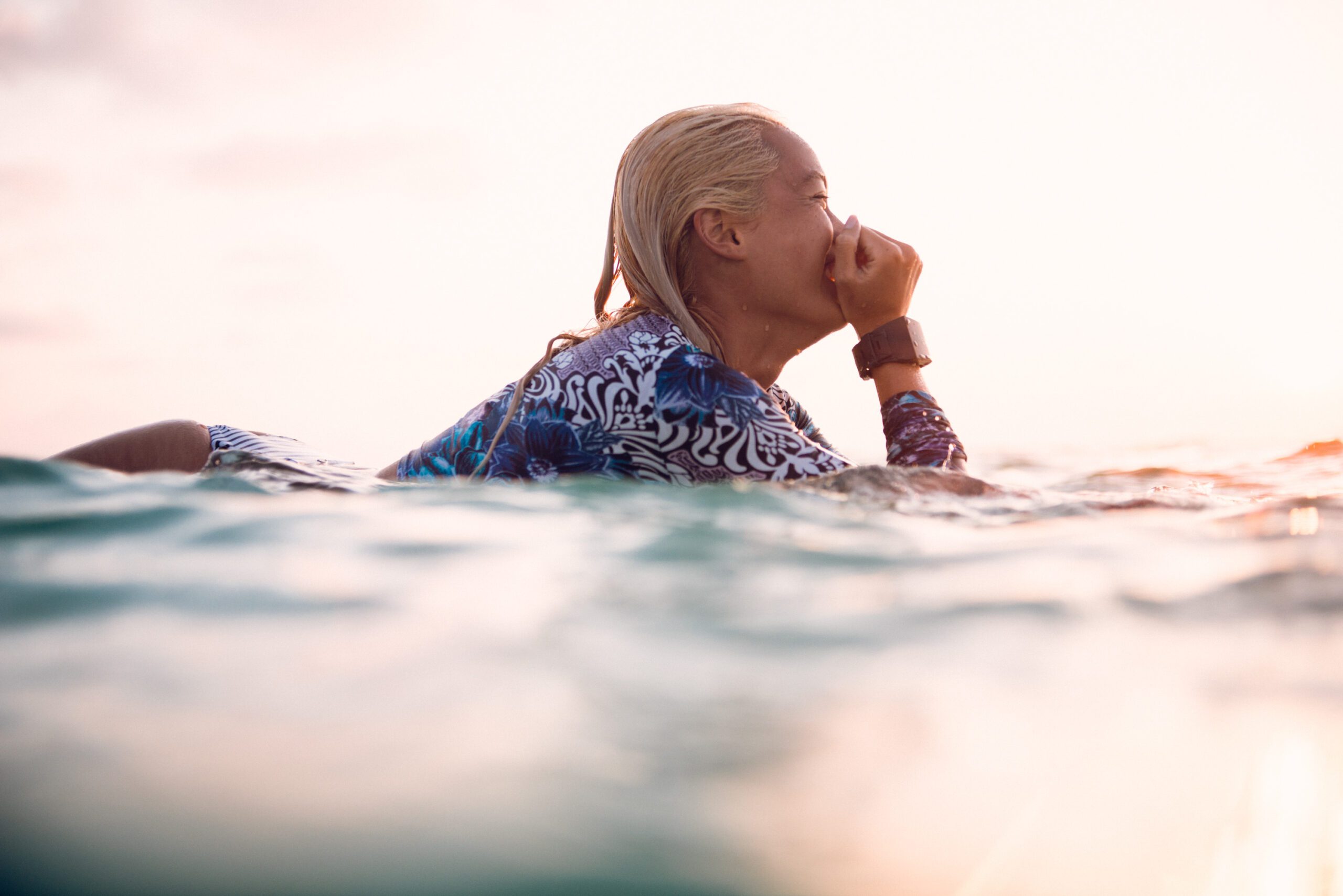 Lizzie enjoying a vibrant coastal sunset in Florida