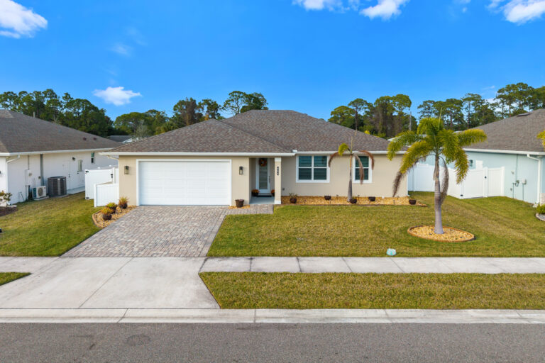 Single-story house with landscaped yard