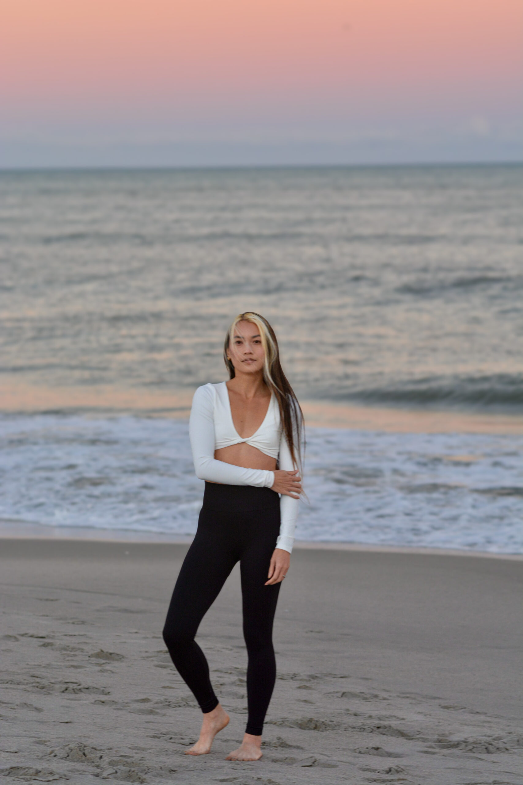 woman at the beach at sunset