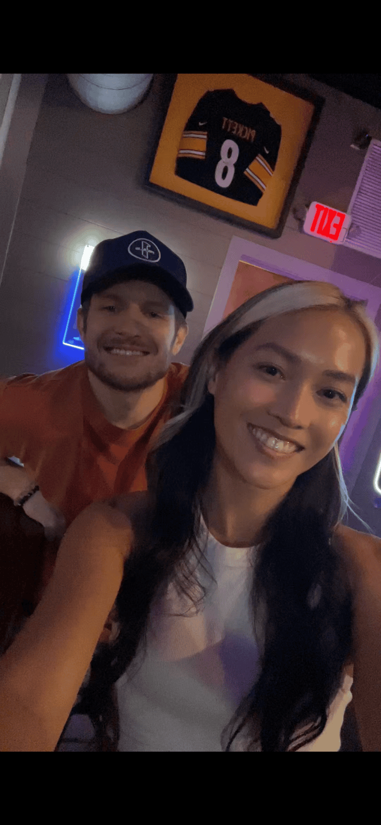 Lizzie and Brandon smiling in a selfie