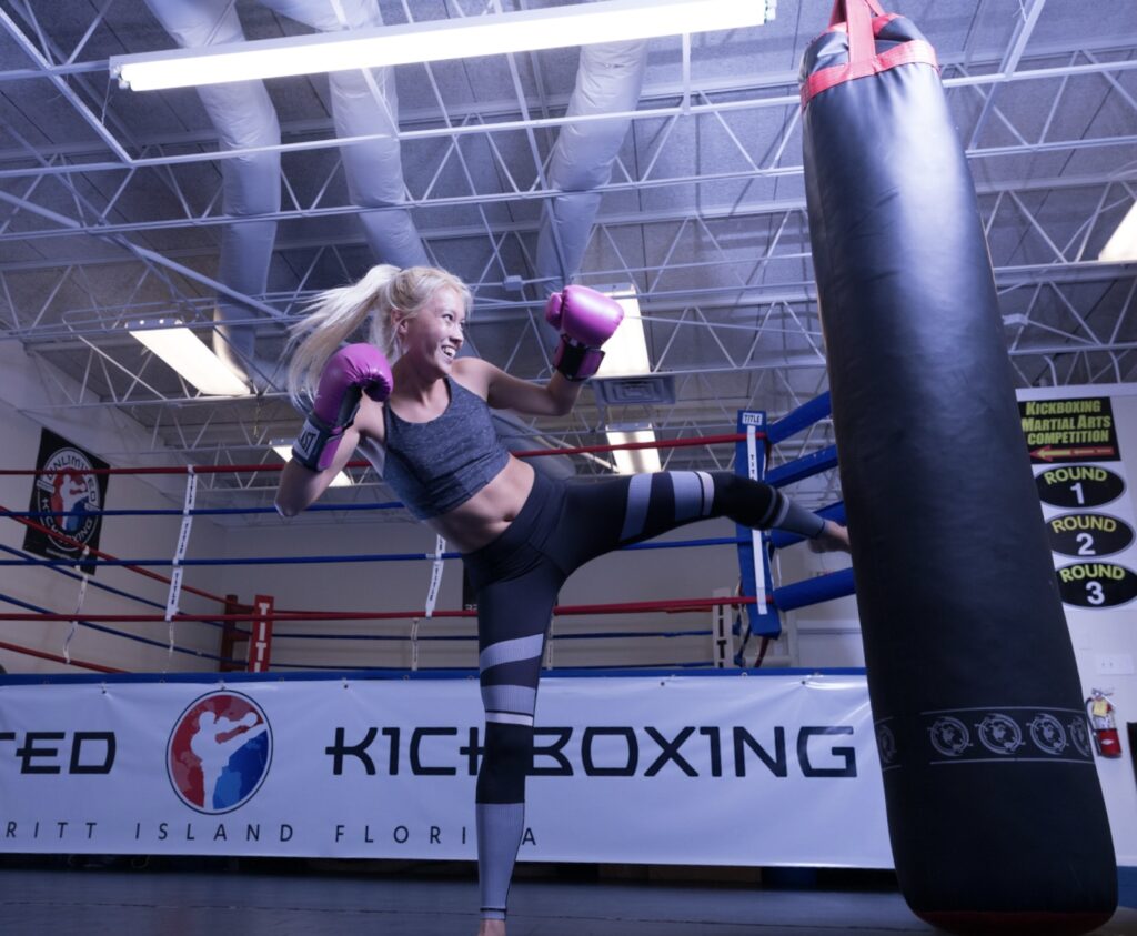 Training on a heavy bag in Hayabusa boxing gloves