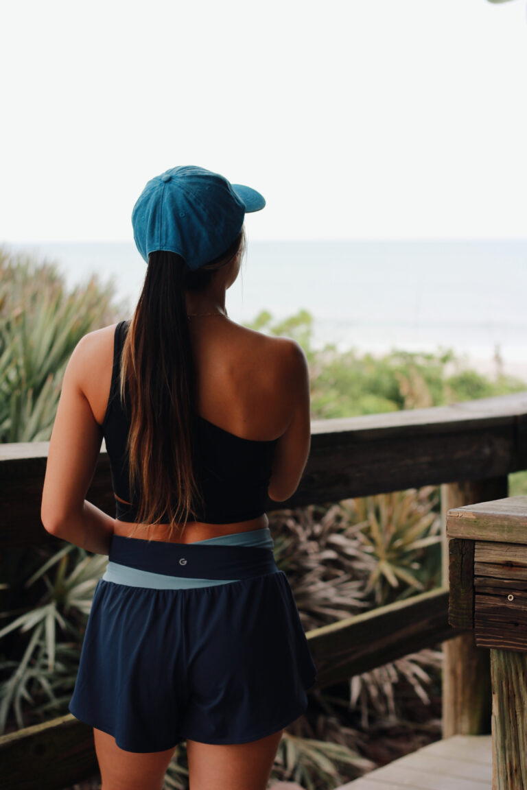 Woman in a black top by the water