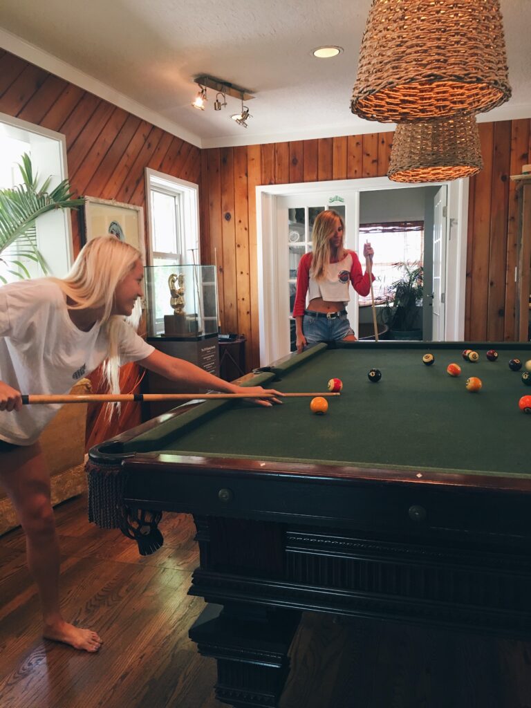 Playing pool during a low-key summer night in