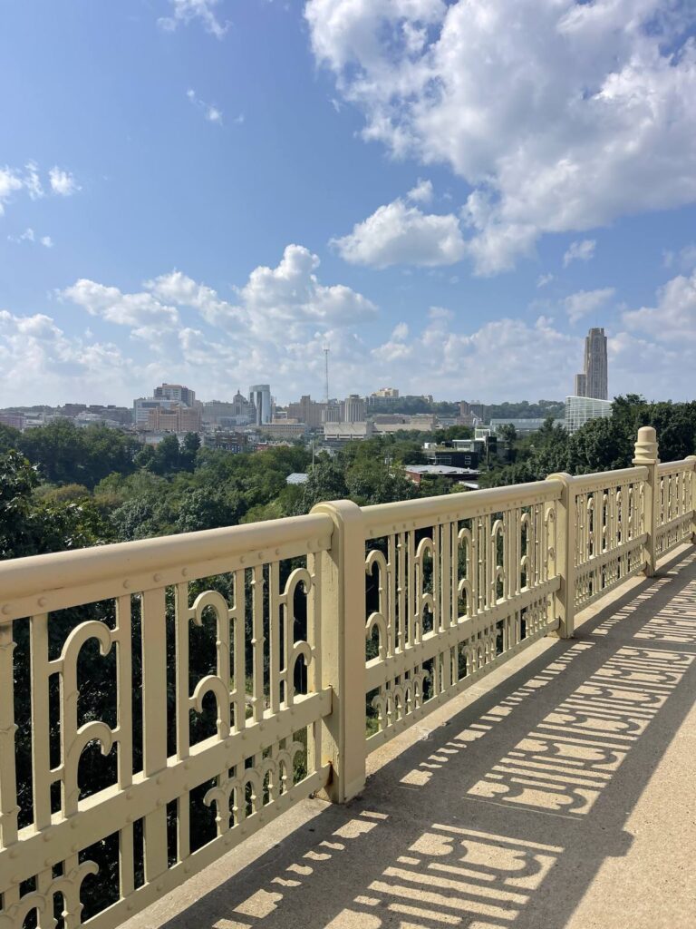 View of the Pittsburgh skyline and Cathedral of Learning from the Panther Hollow Bridge in Schenley Park