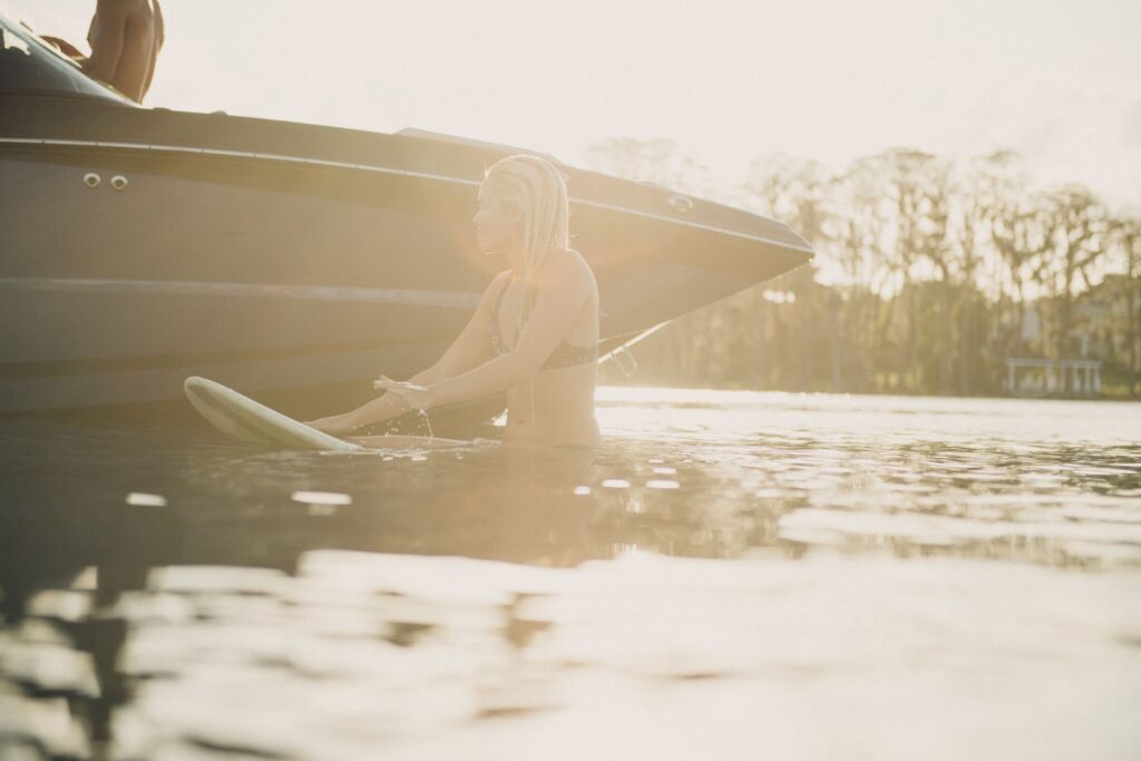 Wakesurfing at sunset in the summer