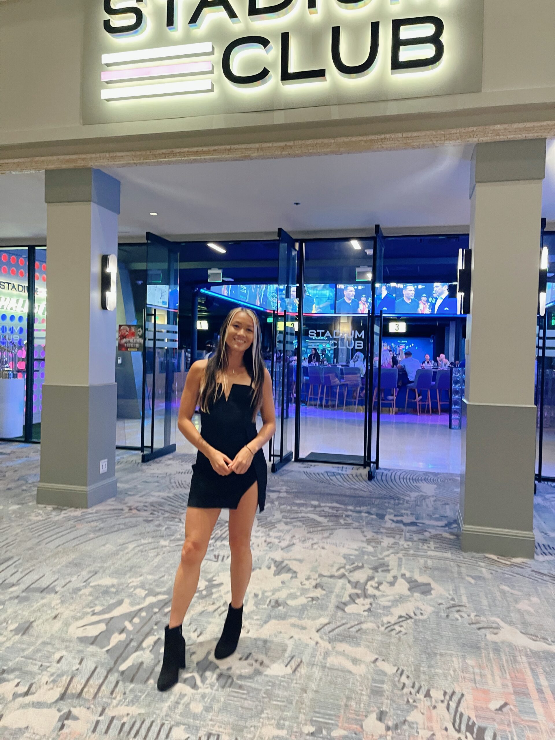 Woman in a little black dress at a night out venue
