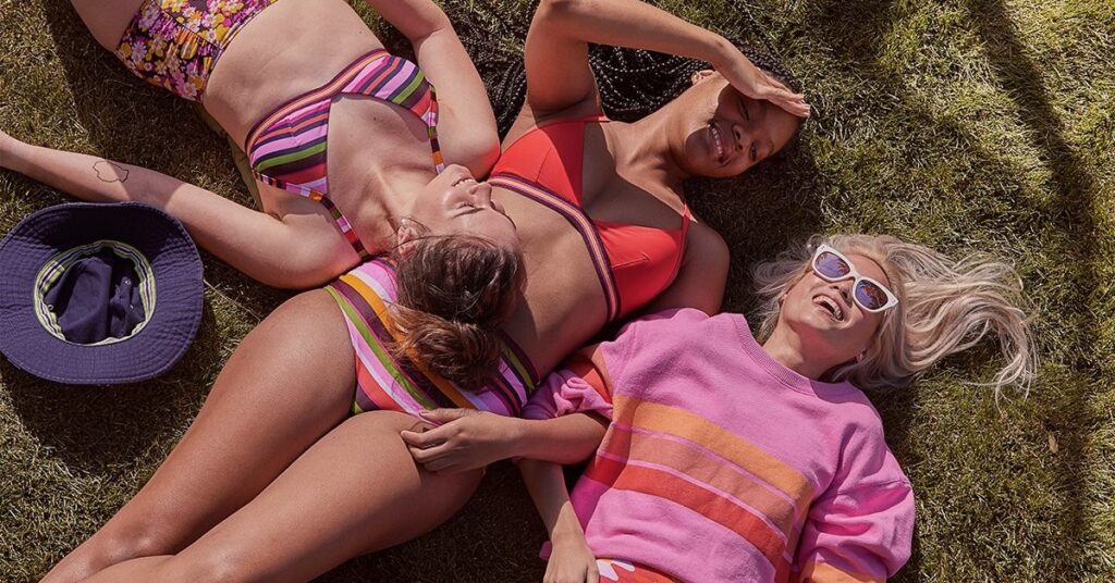 Group lifestyle campaign shot on the grass